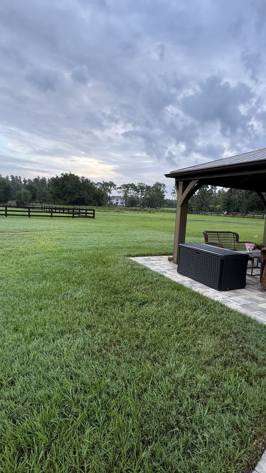 Outdoor living pavilion and paver space